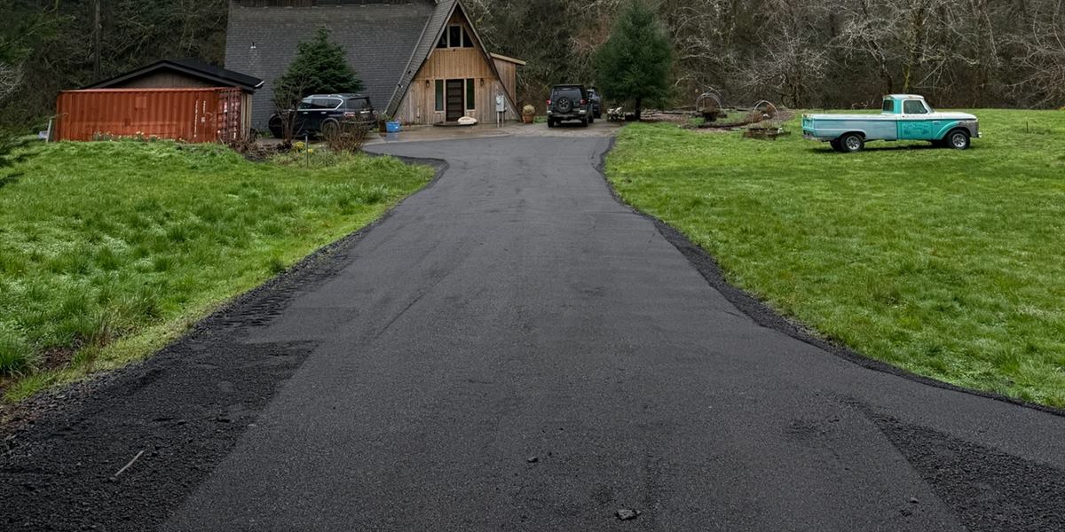Residential driveway with fresh asphalt